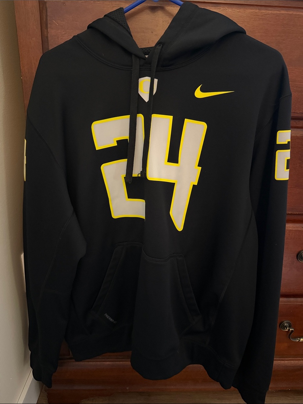 Nike Men’s Oregon Ducks Black Hoodie with Yellow-Trim